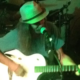 a man playing a guitar