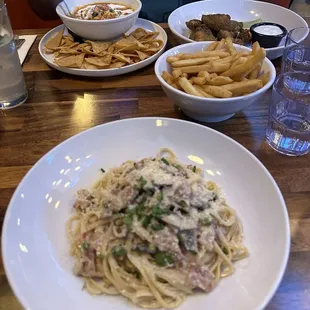 Carbonara Linguine, Turkey Chili, and Wings (Lemon Pepper) with a side of Fries