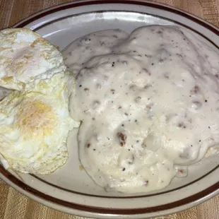 Homemade biscuits and gravy with eggs