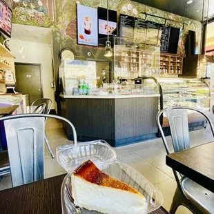a slice of cheesecake in a plastic container