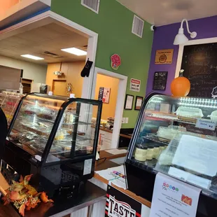 a woman standing in front of the counter