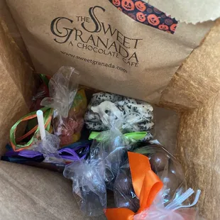 Malt balls, cookies and cream pretzels, gummy spiders, marshmallows, dog treats