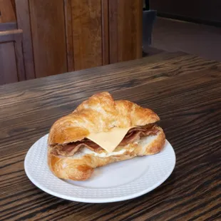 Breakfast Sandwich:
Egg, Bacon and Cheese on a Butter Croissant