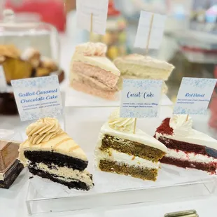 a variety of cakes on display