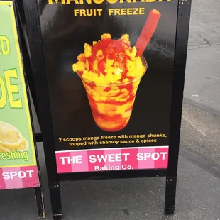 a sign for mangoade fruit freeze