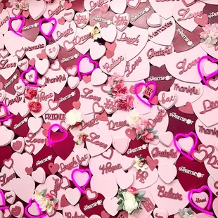 a box full of pink and white hearts