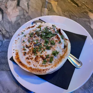 a bowl of soup on a plate