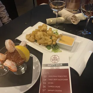 Happy Hour appetizers. Shrimp Cocktail and Fried Cauliflower