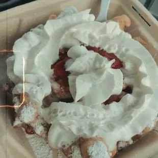 Funnel cake is with strawberries