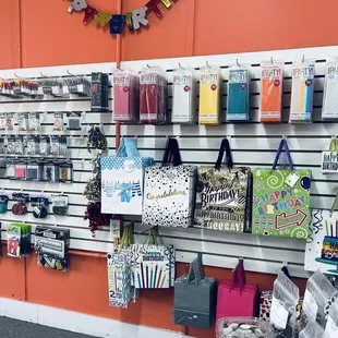 a wall of craft supplies