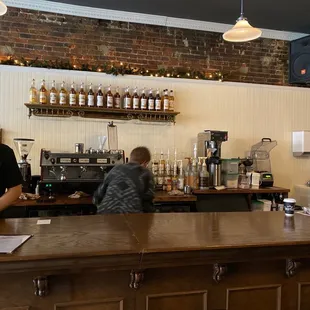 a man and a woman at a bar