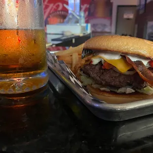 a burger and a glass of beer