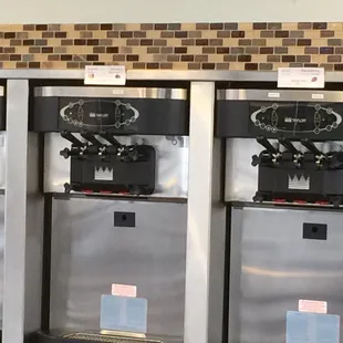 a row of ice cream machines