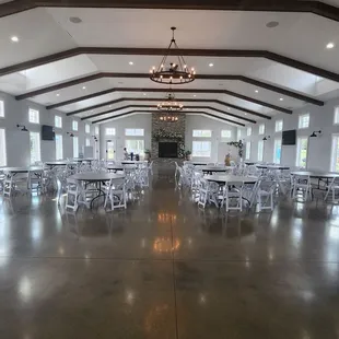 a large room with tables and chairs