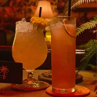 two cocktails on a table