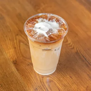 a cold beverage in a plastic cup