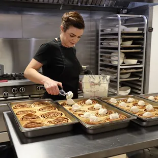 Chef/Owner Helen preparing our delicious cinnamon buns.