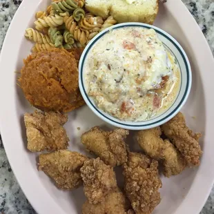 Fried Chix chunks, sweet potato soufflé, pasta salad, tomato pie, cornbread and a drink for 9$
