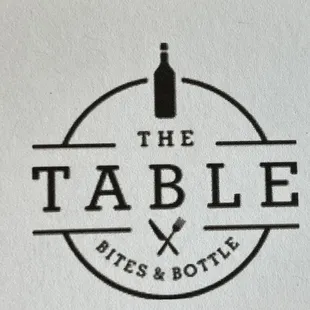 a bottle of wine and a knife