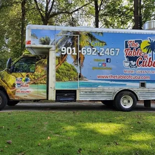 a food truck parked on the side of the road