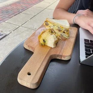 Sausage, egg, and cheese pesto sandwich (half-eaten because it looked too good to wait for photos)