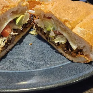 Mexican torta. Too much bread, too messy and not flavorful.
