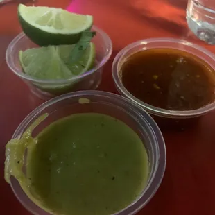 three different sauces and a lime
