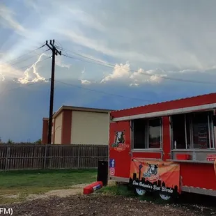a man ordering food from a food truck