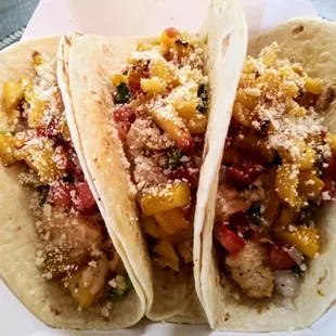 Chipotle chicken and fire roasted peach tacos
