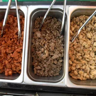 Here's a picture of our famous 3 types of meat for our taco guy catering packages from the taco specialist.