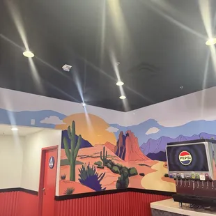 Wall art near drinking fountain