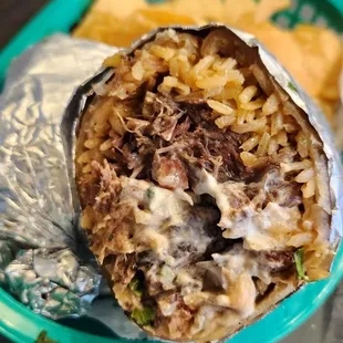 Barbacoa Supreme burrito $9.99 - HUGE and delicious