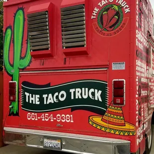 a taco truck parked in a parking lot