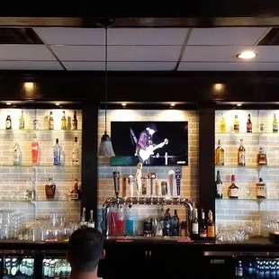 a man sitting at a bar