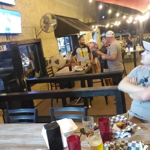 Boxing match on the patio - one of the only places in VA Beach carrying it. Cornhole, fans, and pretty good food.