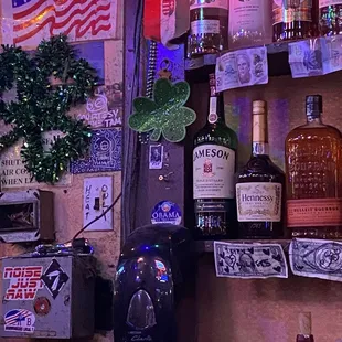 a variety of liquor bottles on a shelf