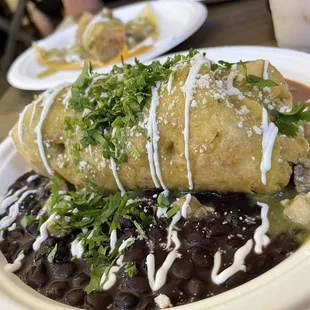 Carnitas chimichanga with black beans