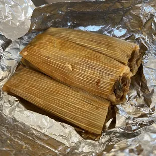 the tamales wrapped in foil