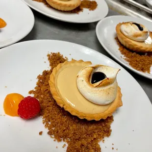 Key Lime tart, toasted meringue and mixed berry sauce