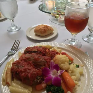 Eggplant Rollatini. So delicious with a filling of spinach and ricotta on a bed of pasta aioli.