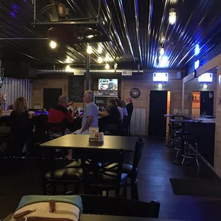 people sitting at the bar