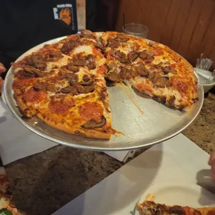 The Italian Meats Pizza! The Best Pizza in Town with Beer in the Dough!