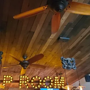 a wooden ceiling with a sign that says hollander