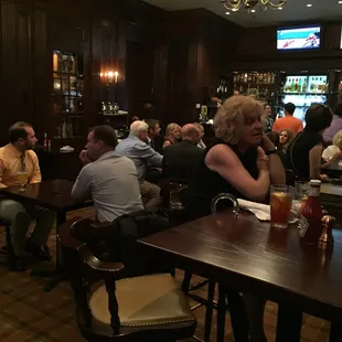 people sitting at the bar