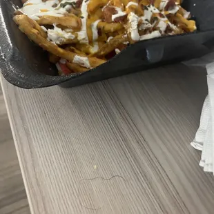 Fries that I specifically asked for sour cream on the side! What a nice way to run your business.