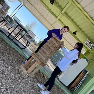 two girls stacking blocks