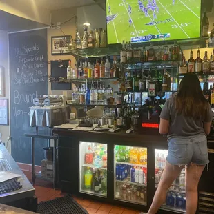 a woman at the bar