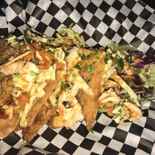 Today&apos;s special, chicken wonton tacos.