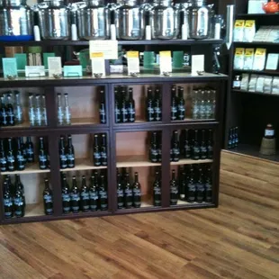 Myriads of oils and vinegars with cups to taste