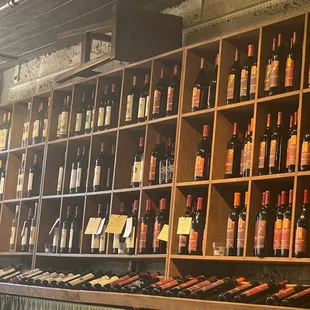 a wall of wine bottles